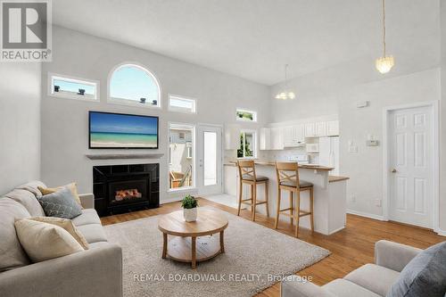 *Virtually Staged* - 5 Maple Park Private, Ottawa, ON - Indoor Photo Showing Living Room With Fireplace