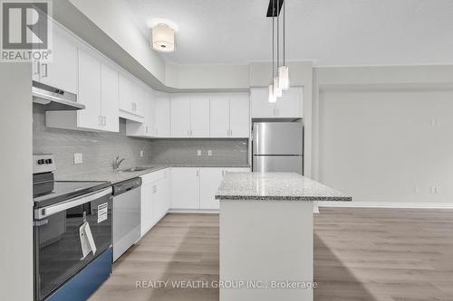 69 - 25 Isherwood Avenue N, Cambridge, ON - Indoor Photo Showing Kitchen With Stainless Steel Kitchen With Upgraded Kitchen