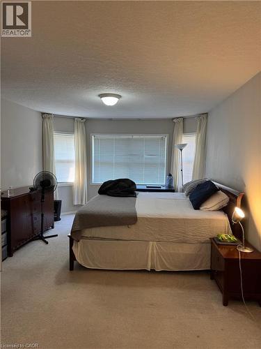 Recessed lighting and carpeted flooring - 720 Brookmill Place, Waterloo, ON - Indoor Photo Showing Bedroom