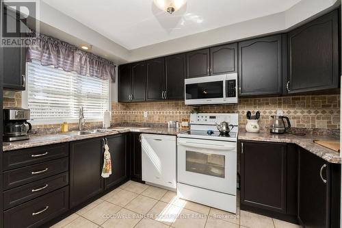 593 Caverhill Crescent, Milton, ON - Indoor Photo Showing Kitchen With Double Sink