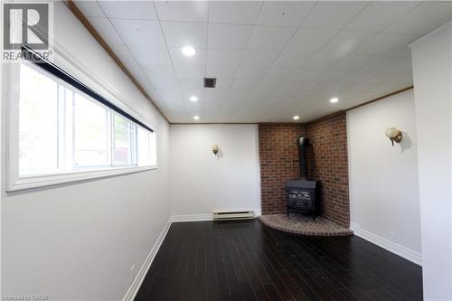 77 Orchard Mill Crescent, Kitchener, ON - Indoor Photo Showing Other Room With Fireplace