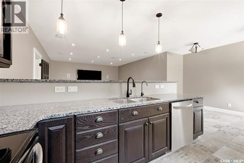 7 Lott Road E, White City, SK - Indoor Photo Showing Kitchen With Double Sink