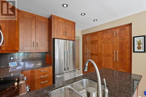 11 Canmore Boulevard, Toronto, ON - Indoor Photo Showing Kitchen With Double Sink