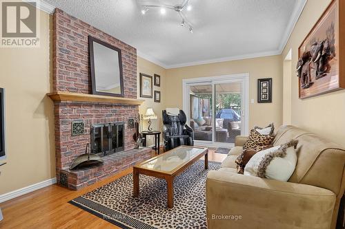 Family Room with fireplace - 11 Canmore Boulevard, Toronto, ON - Indoor Photo Showing Living Room With Fireplace