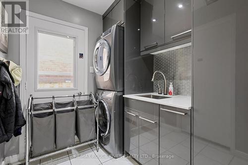 Main Floor Laundry Room with Side Entrance - 11 Canmore Boulevard, Toronto, ON - Indoor Photo Showing Laundry Room