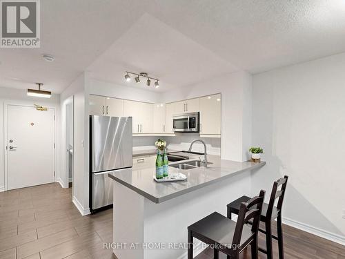 404 - 30 Hayden Street, Toronto, ON - Indoor Photo Showing Kitchen With Double Sink