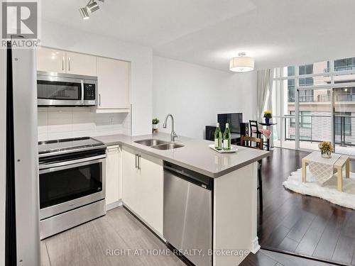 404 - 30 Hayden Street, Toronto, ON - Indoor Photo Showing Kitchen With Double Sink