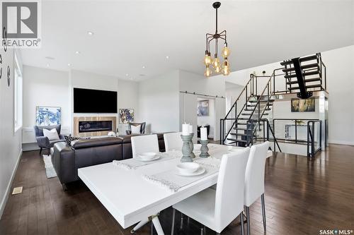 111 Fleming Crescent, Saskatoon, SK - Indoor Photo Showing Dining Room With Fireplace