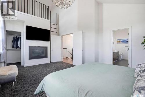 111 Fleming Crescent, Saskatoon, SK - Indoor Photo Showing Bedroom With Fireplace