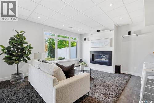 111 Fleming Crescent, Saskatoon, SK - Indoor Photo Showing Living Room With Fireplace