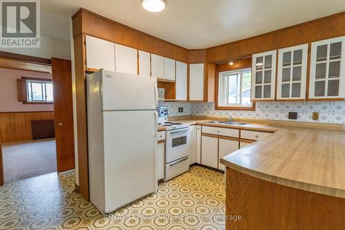 fridge and stove stay - 215 Knoll Street, Port Colborne (Main Street), ON - Indoor Photo Showing Kitchen With Double Sink