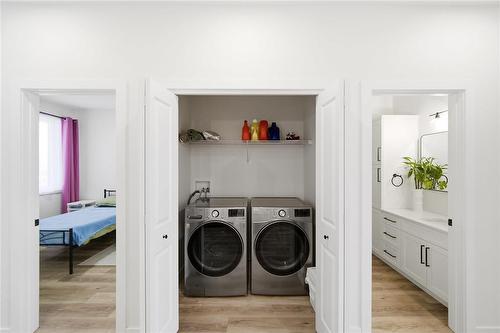 Main Floor Laundry - 223 Harmony Lane, Steinbach, MB - Indoor Photo Showing Laundry Room