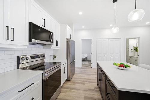 223 Harmony Lane, Steinbach, MB - Indoor Photo Showing Kitchen With Upgraded Kitchen
