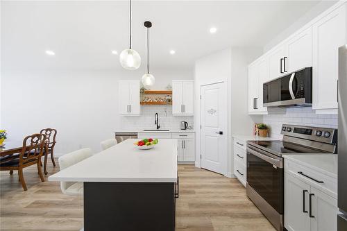 223 Harmony Lane, Steinbach, MB - Indoor Photo Showing Kitchen With Upgraded Kitchen