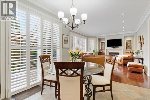 150 Garth Massey Drive, Cambridge, ON - Indoor Photo Showing Dining Room With Fireplace