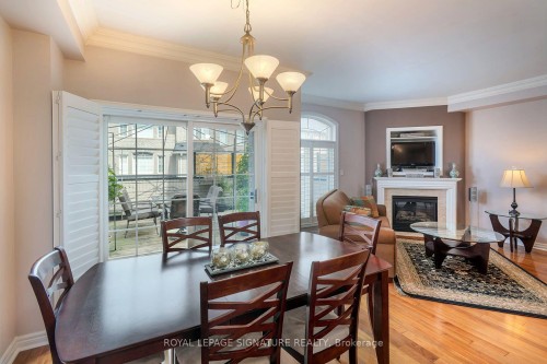 469 Bristol Road W, Mississauga, ON - Indoor Photo Showing Dining Room With Fireplace