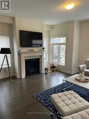 3930 Tufgar Crescent, Burlington, ON - Indoor Photo Showing Living Room With Fireplace