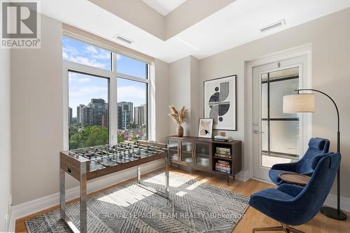 This space virtually enhanced to a games room - 1003 - 245 Kent Street N, Ottawa, ON - Indoor