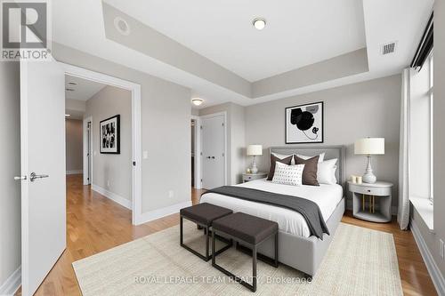 Enhanced virtual Luxury Bedrooom furnishings - 1003 - 245 Kent Street N, Ottawa, ON - Indoor Photo Showing Bedroom