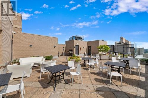 Rooftop Patio with BBQ's, tables & chairs - 1003 - 245 Kent Street N, Ottawa, ON - Outdoor With Deck Patio Veranda