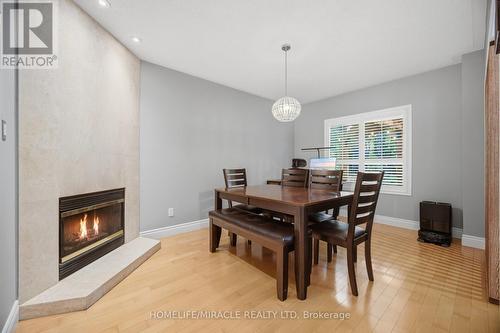 6089 Carradine Court, Mississauga, ON - Indoor Photo Showing Dining Room With Fireplace