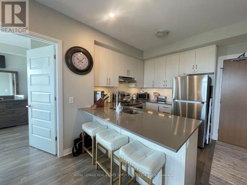 229 - 1105 Leger Way, Milton, ON - Indoor Photo Showing Kitchen With Stainless Steel Kitchen With Double Sink