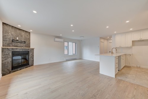 Living Room - 3311 Rue Mistral, Brossard, QC - Indoor With Fireplace