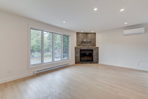 Living Room - 3311 Rue Mistral, Brossard, QC - Indoor Photo Showing Living Room With Fireplace