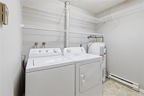 8-700 Blantyre Ave, Winnipeg, MB - Indoor Photo Showing Laundry Room