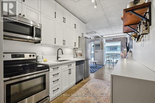 518 - 150 Sudbury Street, Toronto (Little Portugal), ON - Indoor Photo Showing Kitchen With Stainless Steel Kitchen With Upgraded Kitchen