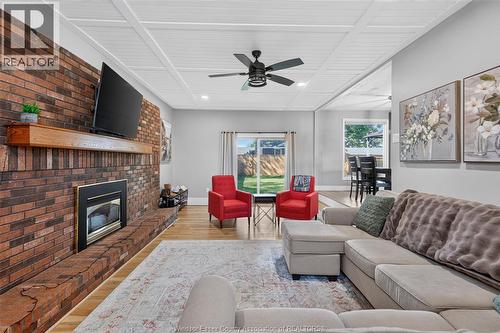 520 Front Road, Lasalle, ON - Indoor Photo Showing Living Room With Fireplace