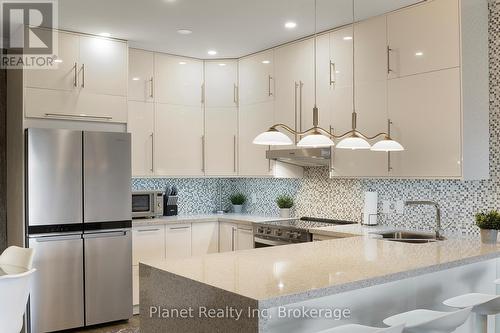 507 - 60 Wyndham Street S, Guelph (St. Patrick'S Ward), ON - Indoor Photo Showing Kitchen With Stainless Steel Kitchen With Double Sink With Upgraded Kitchen