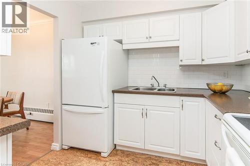 24 Midland Drive Unit# 402, Kitchener, ON - Indoor Photo Showing Kitchen With Double Sink