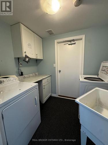Shared laundry has locked access for both tenants - A - 34 Engel Crescent, Barrie, ON - Indoor Photo Showing Laundry Room