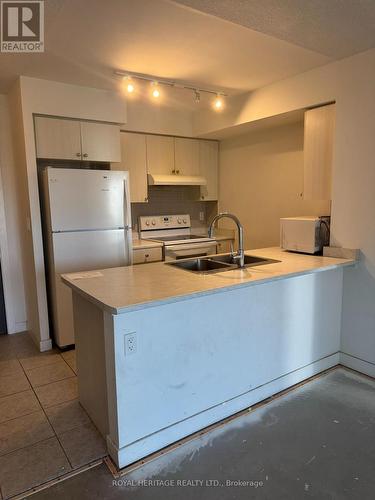 403 - 1346 Danforth Road, Toronto, ON - Indoor Photo Showing Kitchen With Double Sink