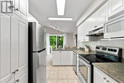 26 Milner Downs Crescent, Ottawa, ON - Indoor Photo Showing Kitchen With Double Sink