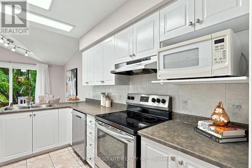 26 Milner Downs Crescent, Ottawa, ON - Indoor Photo Showing Kitchen With Double Sink