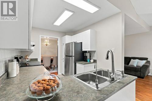 26 Milner Downs Crescent, Ottawa, ON - Indoor Photo Showing Kitchen With Double Sink