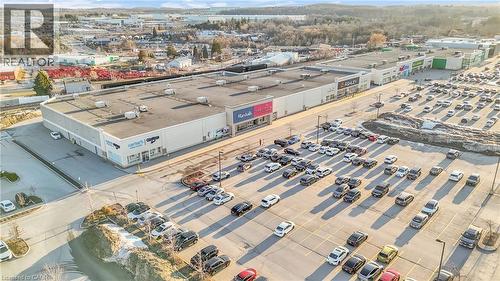 Expansive commercial property with a large, paved parking area - 589 Fairway Road S, Kitchener, ON 