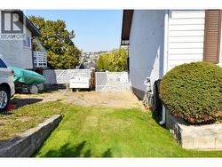 Side yard with gate leading to back yard - 