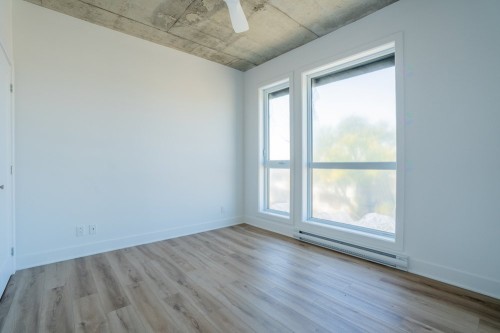 Chambre à coucher - 102-8945 Boul. Viau, Montréal (Saint-Léonard), QC - Indoor Photo Showing Other Room