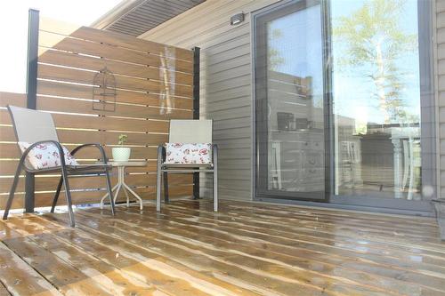Another view of the deck off the dining area. - 7 Dalvik Road, Gimli Rm, MB -  With Exterior
