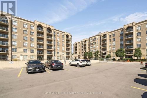 210 - 2075 Amherst Heights Drive, Burlington (Brant Hills), ON - Outdoor With Balcony With Facade