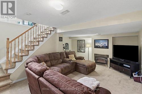 757 Nesting Way, Ottawa, ON - Indoor Photo Showing Living Room With Fireplace