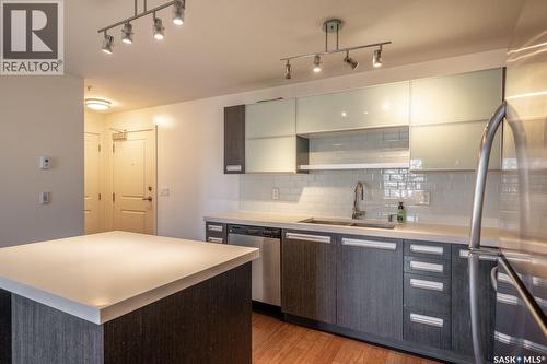 102 1610 Dakota Drive, Regina, SK - Indoor Photo Showing Kitchen With Stainless Steel Kitchen With Double Sink With Upgraded Kitchen