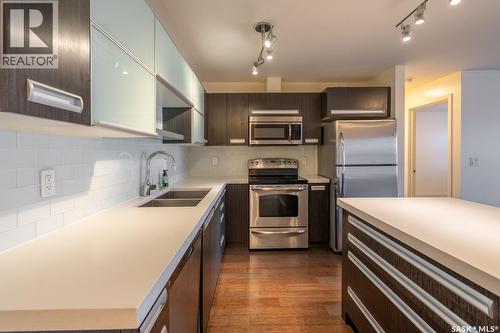 102 1610 Dakota Drive, Regina, SK - Indoor Photo Showing Kitchen With Stainless Steel Kitchen With Double Sink With Upgraded Kitchen