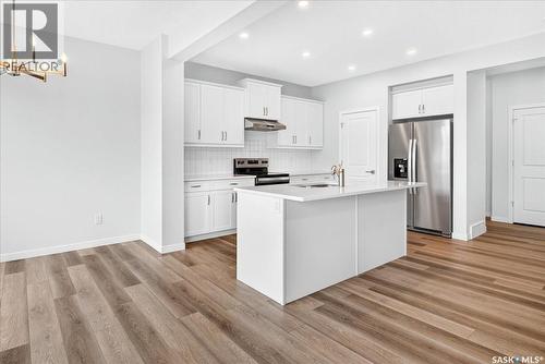 3296 Favel Drive, Regina, SK - Indoor Photo Showing Kitchen With Stainless Steel Kitchen With Upgraded Kitchen