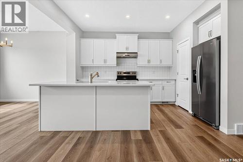3296 Favel Drive, Regina, SK - Indoor Photo Showing Kitchen With Stainless Steel Kitchen