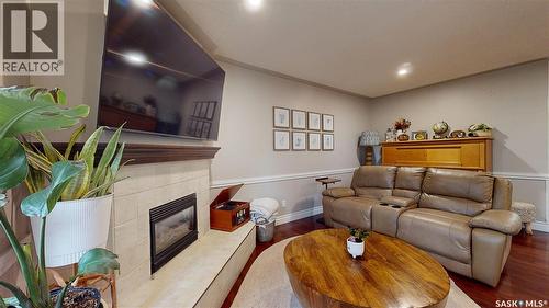 3107 Andreychuk Place E, Regina, SK - Indoor With Fireplace