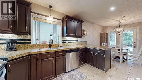 3107 Andreychuk Place E, Regina, SK - Indoor Photo Showing Kitchen With Double Sink